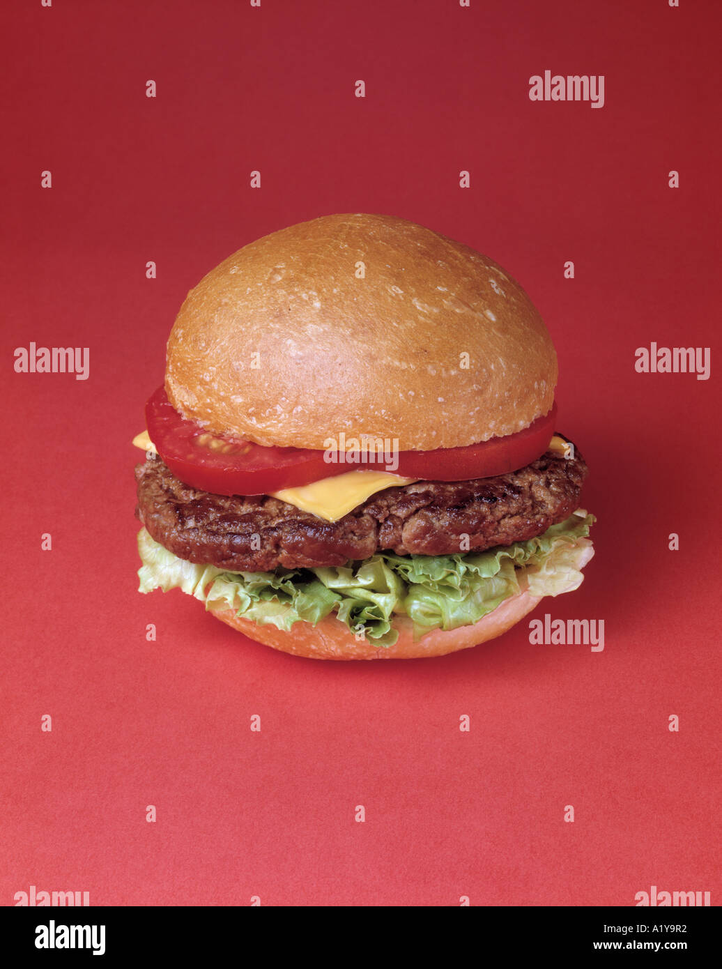 large jumbo burger cheeseburger beef patty roll bun lettuce tomato