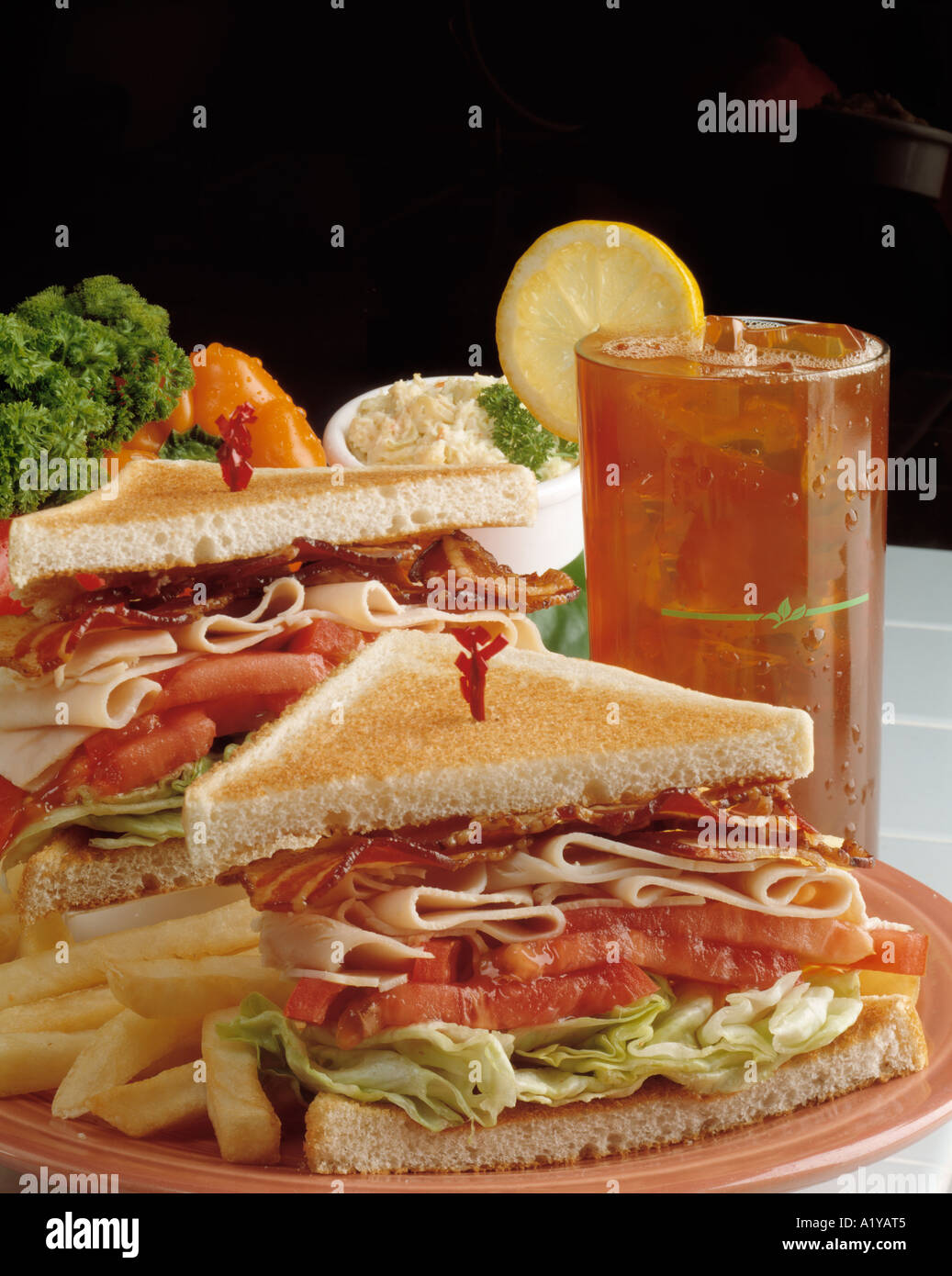 sliced turkey bacon lettuce tomato tomatoe club sandwich toast french