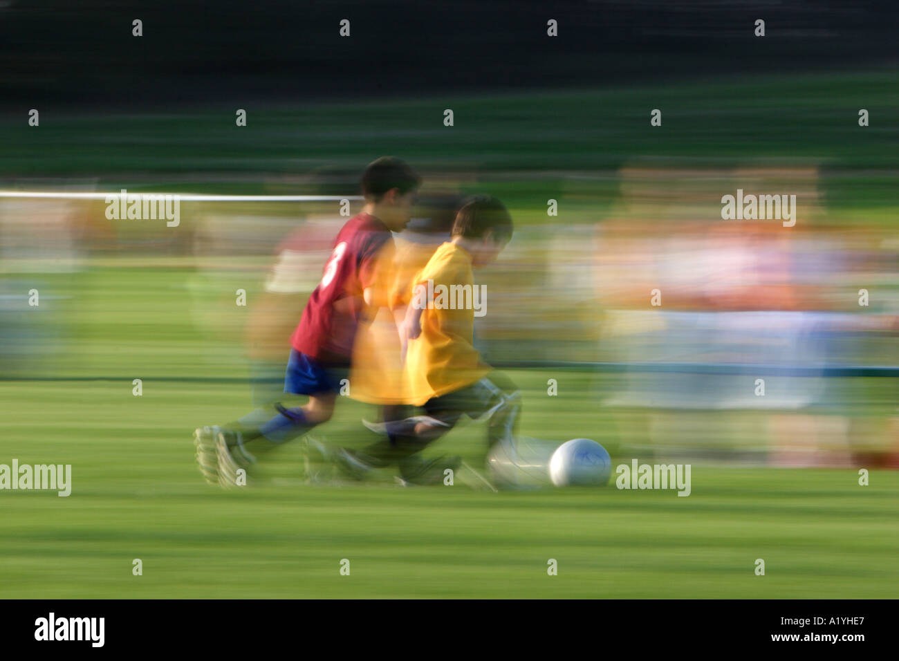 Kids in motion playing soccer stock photo alamy