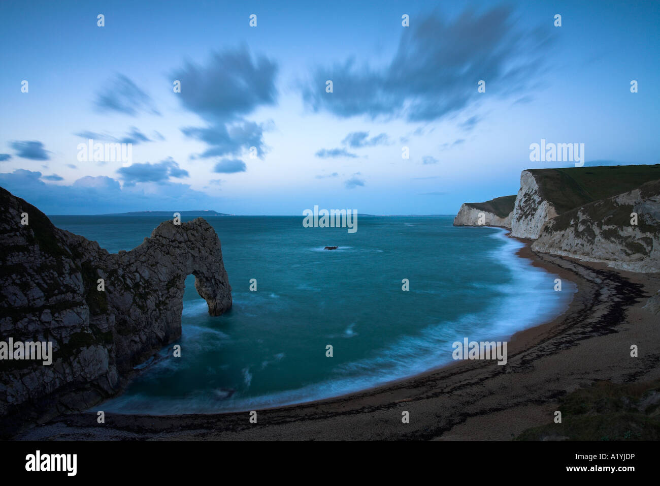 Dawn atop the cliffs at Durdle Door, Dorset Stock Photo