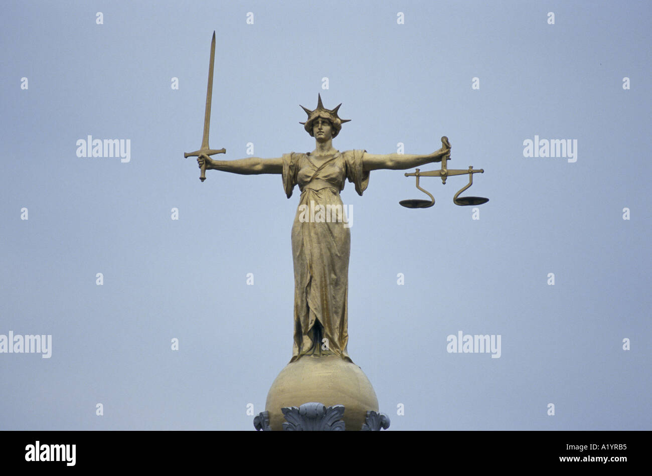 SCULPTURE OF GODDESS HOLDING SCALES OF JUSTICE SWORD AT THE OLD Stock