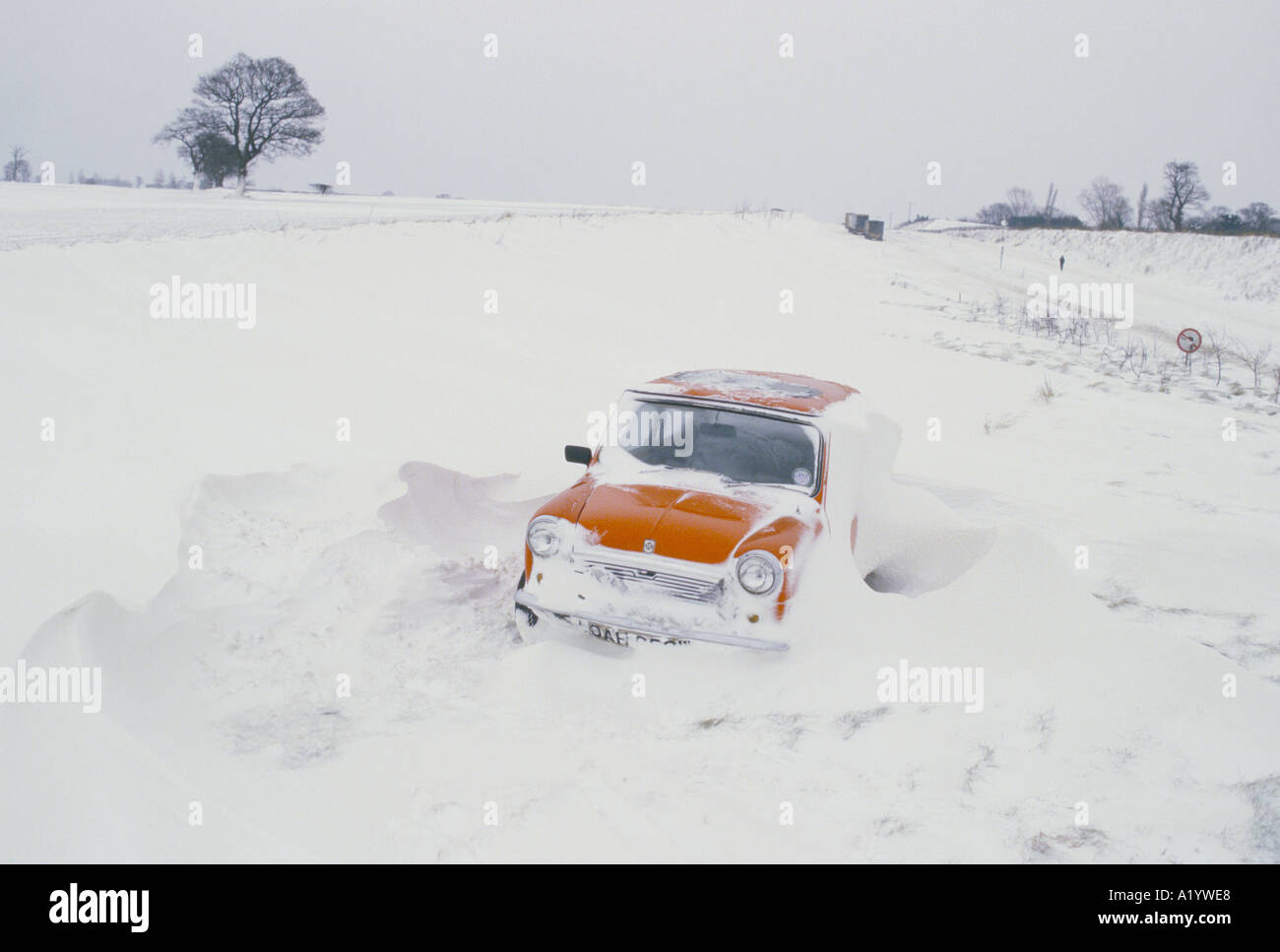 SNOWBOUND CAR IN NORFOLK Stock Photo