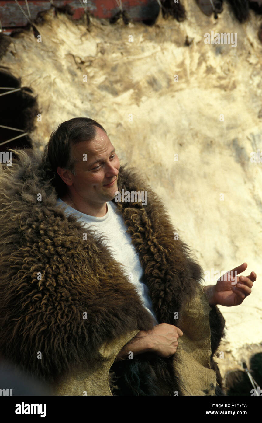 man wearing tanned buffalo hide Stock Photo