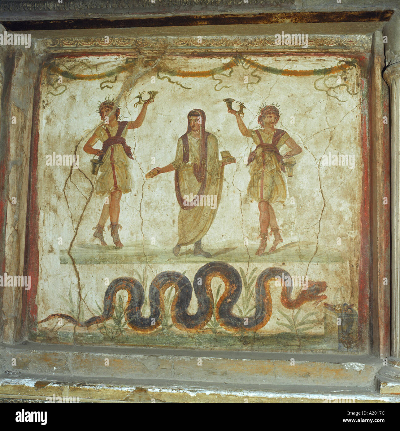 The Lararium wall paintings in the House of the Vettii in Pompeii Italy G R Richardson Stock Photo