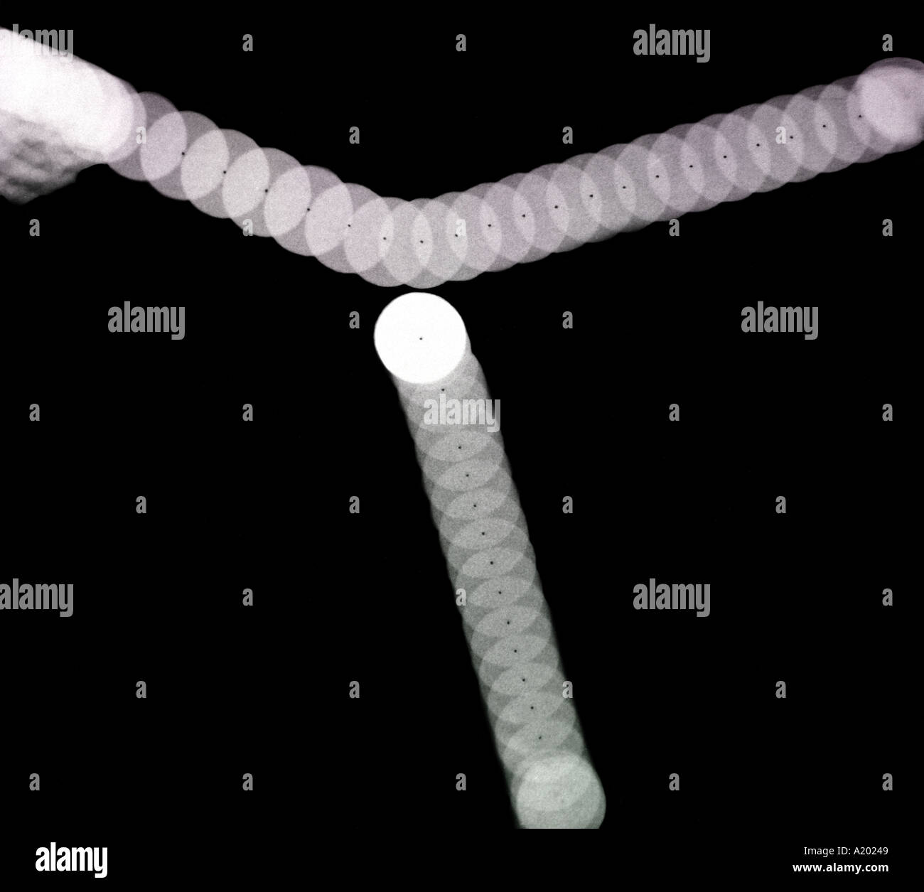 during an elastic collision between two dry ice pucks moving on a frictionless surface energy and momentum are conserved Stock Photo