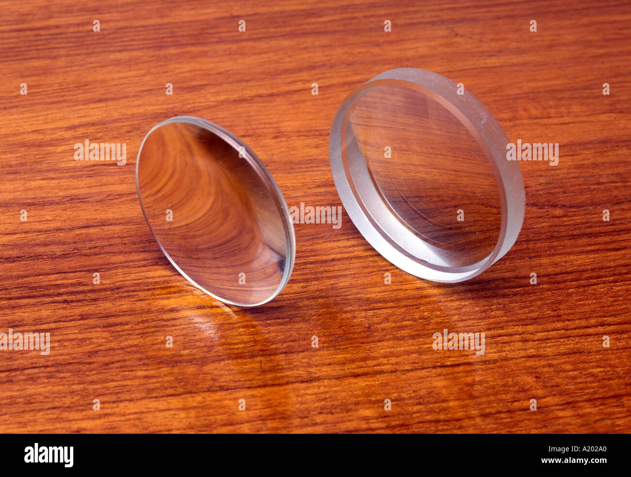 convex and concave lenses on a laboratory bench Stock Photo