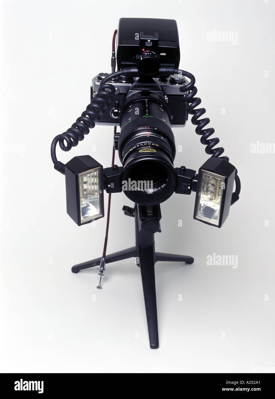 Olympus OM2 film camera with macro lens and extension tube twin macro