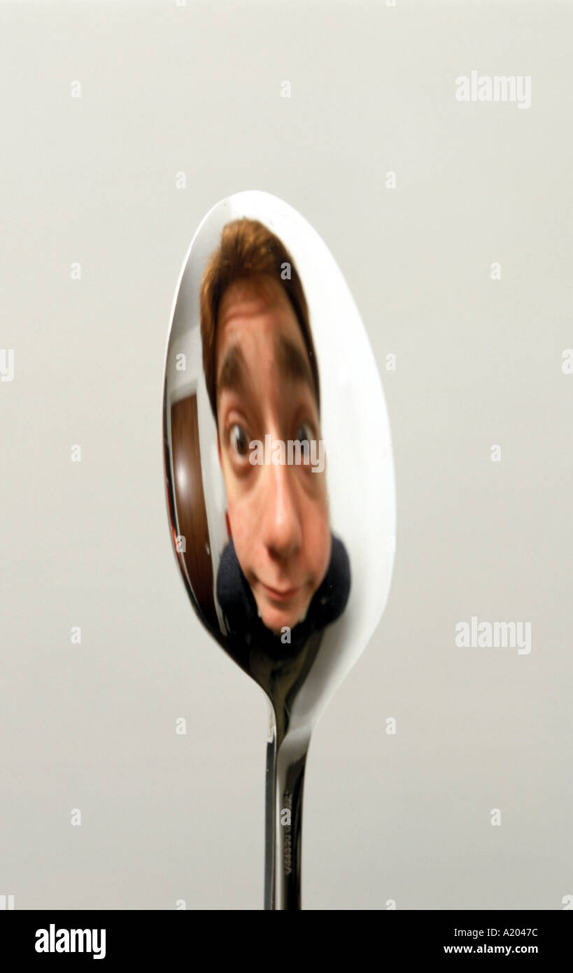 reflection in the convex side of a spoon image erect right way up Stock  Photo - Alamy