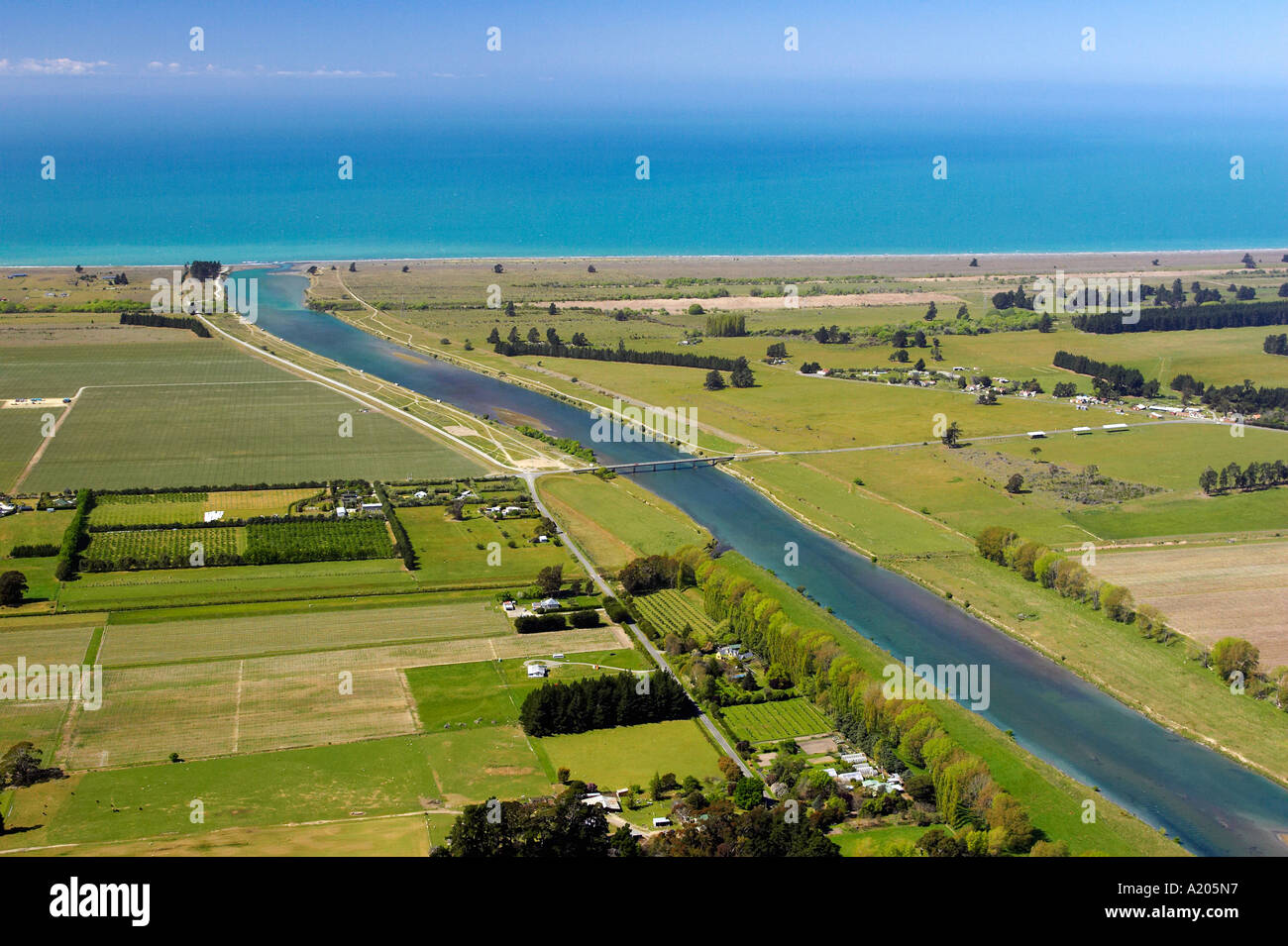Farmland and Wairau Diversion Cloudy Bay Marlborough South Island New Zealand aerial Stock Photo