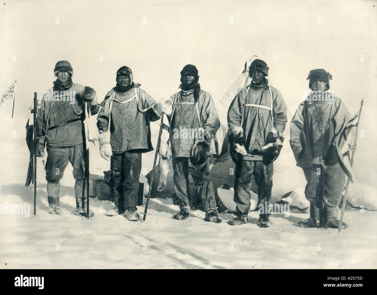 At the South Pole left to right Wilson Scott Evans Oates Bowers with Amundsen s tent behind them Stock Photo