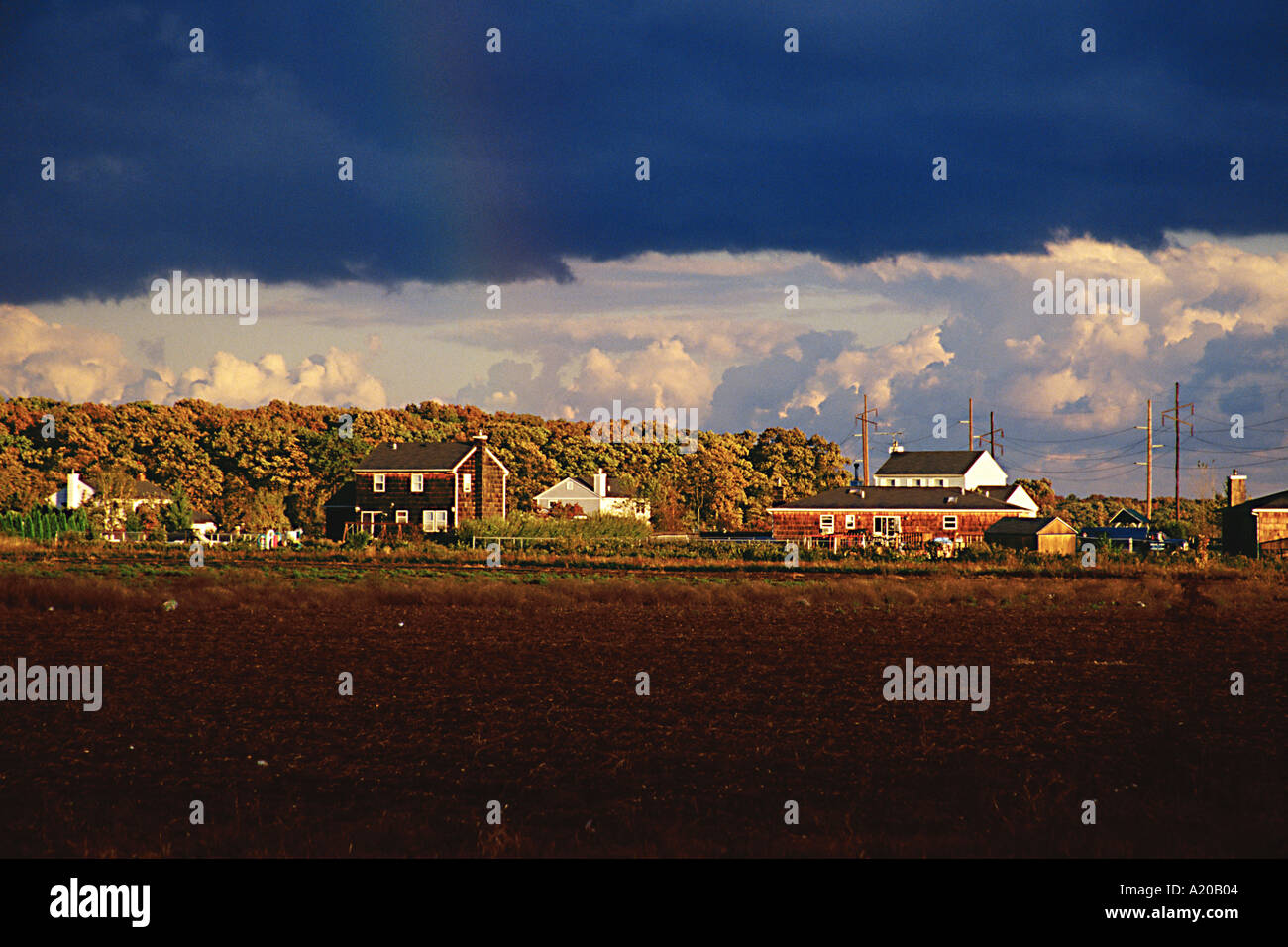 Farm after storm with rainbow Stock Photo - Alamy