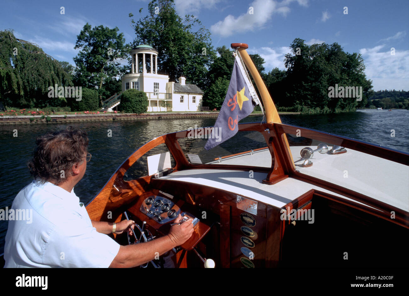 A Bates Star Craft motor cruiser on the River Thames at Henley on Thames Oxfordshire England UK Stock Photo