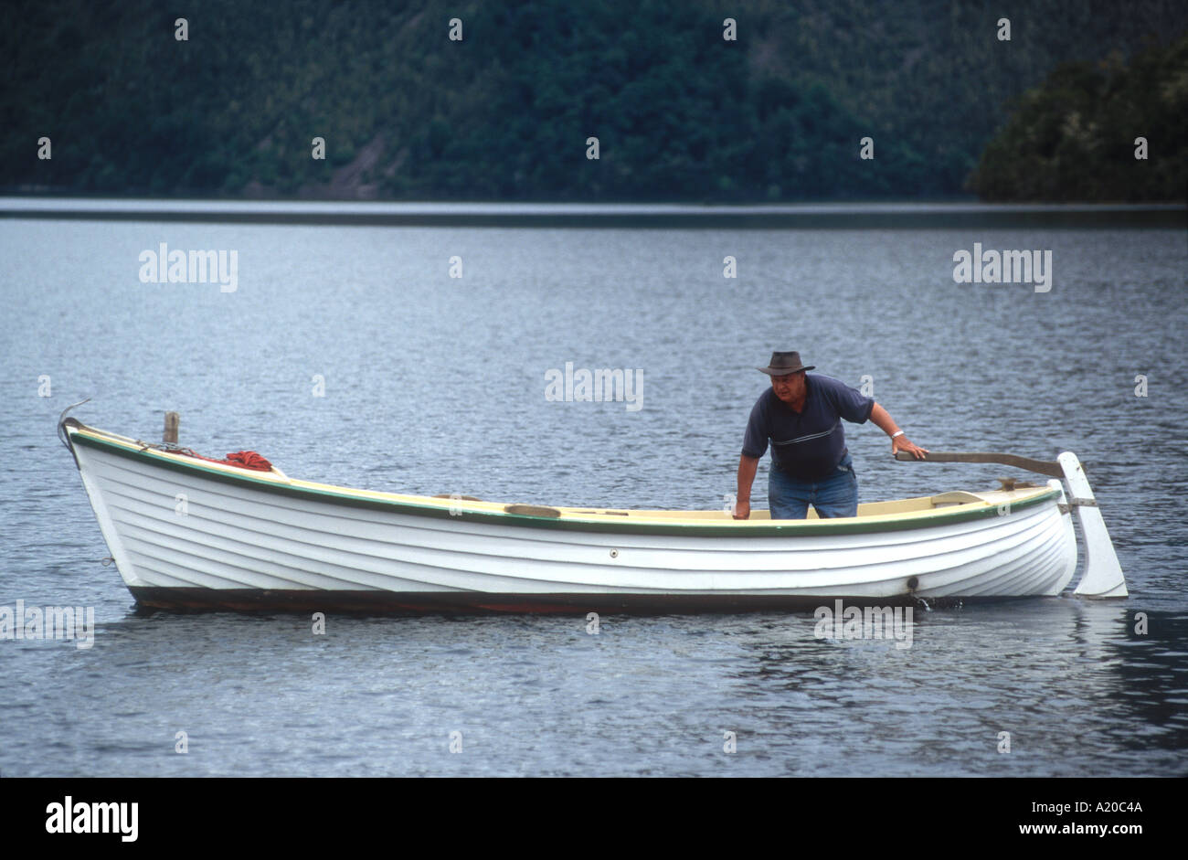 A traditional double ended inboard motor boat at Lake Rotoiti Nelson National Park Marlborough South Island New Zealand Stock Photo