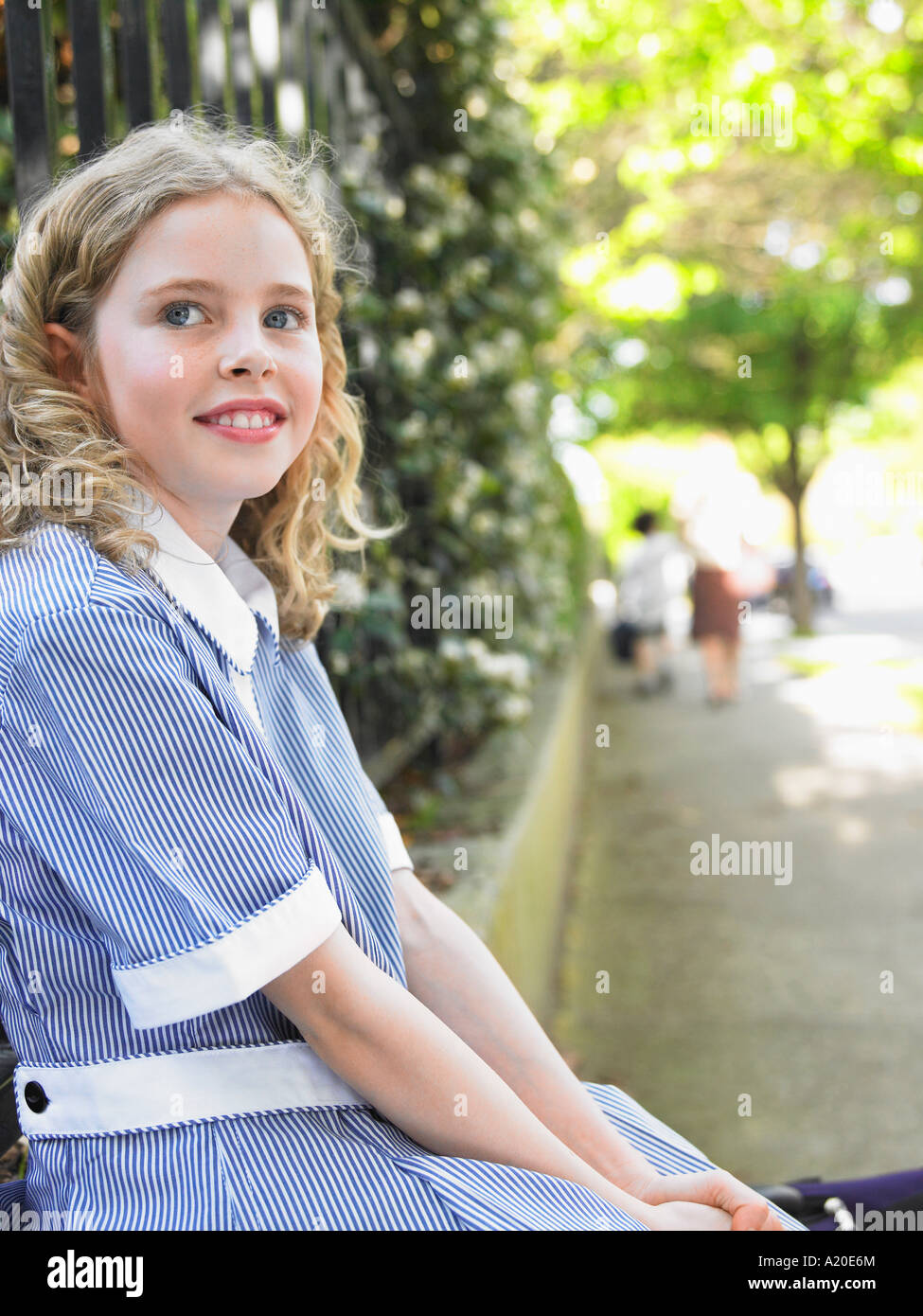 Elementary school girl sitting hi-res stock photography and images - Alamy