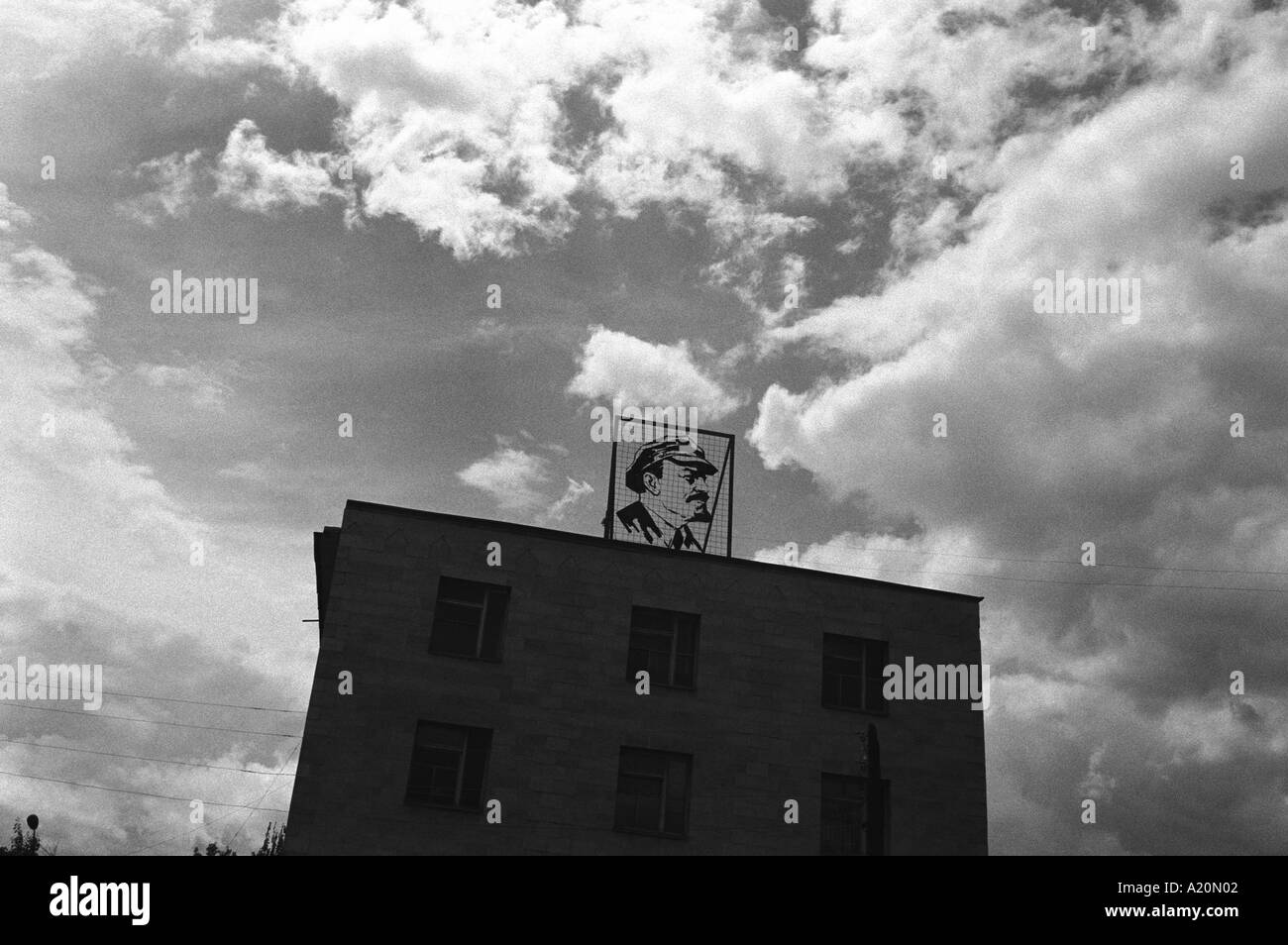 An icon of Lenin looks out from a roof top on a building near Lake Issyk Kul, Kyrgyzstan, CIS Stock Photo