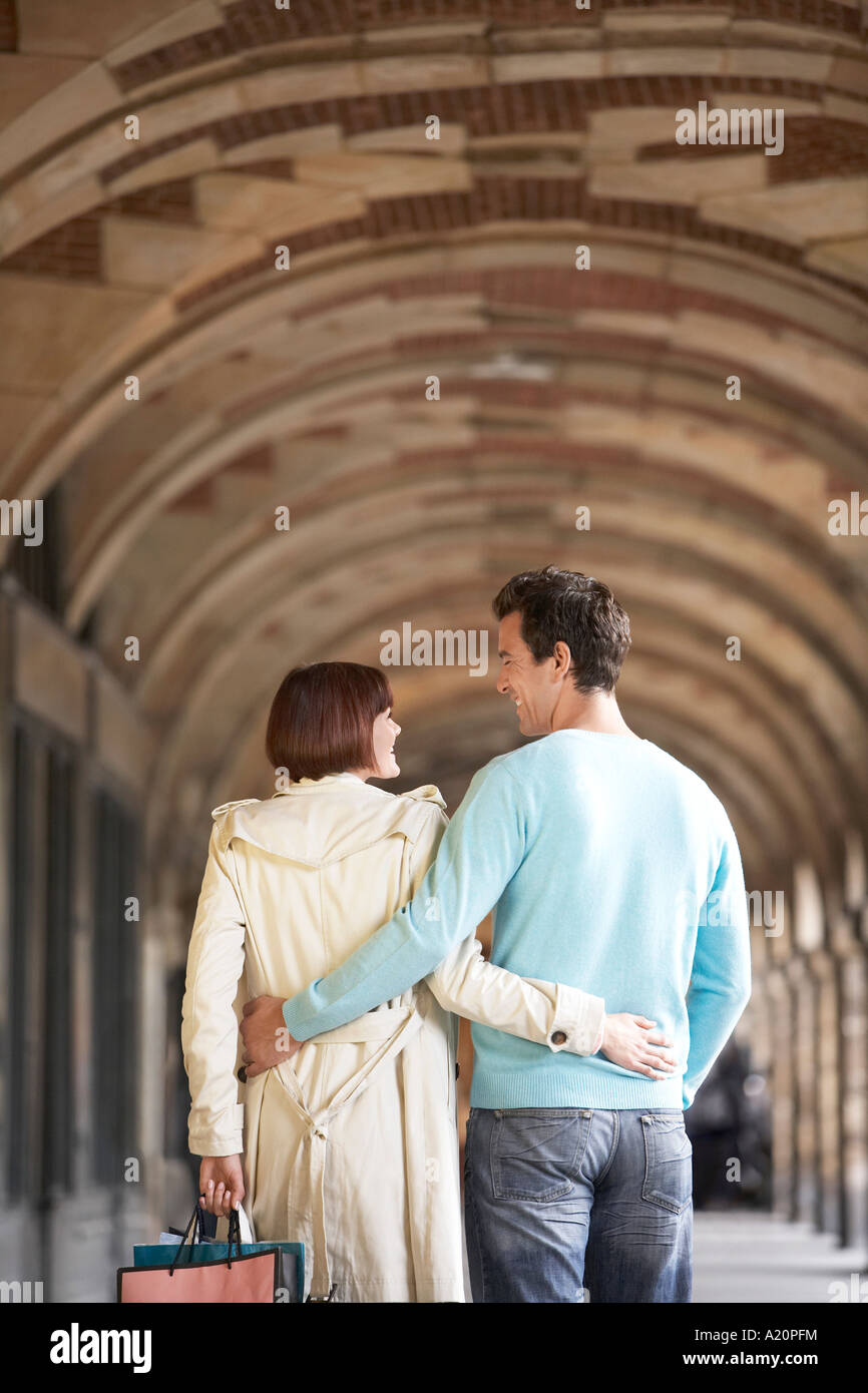 Couple With Arms Round Each Other Walking Through Archway Back View Stock Photo Alamy Couple With Arms Round Each Other Walking Through Archway Back View Stock Photo Alamy