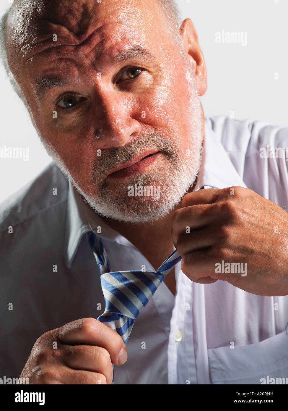 Loosening tie hi-res stock photography and images - Alamy