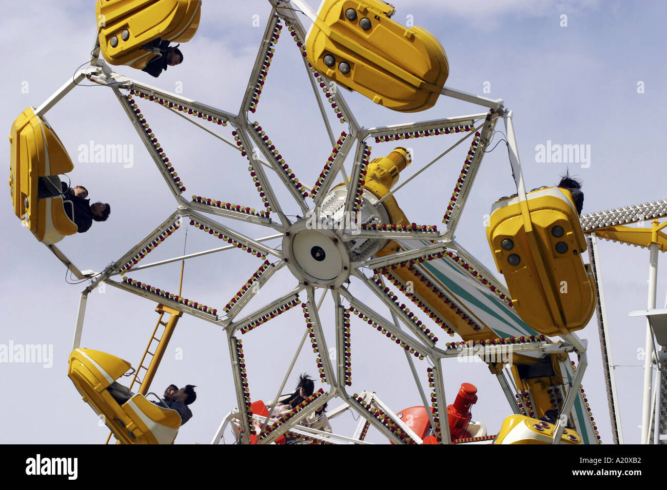 Rides in the Toshimaen amusement and funfair park silhouetted against the sky, Tokyo, Japan. Stock Photo