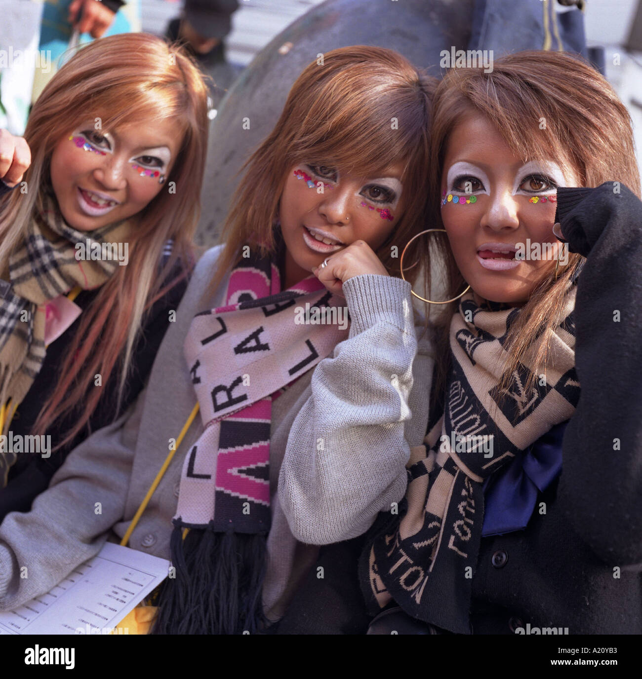 Japanese girls wearing clothes and make-up in the Yamamba / ganguro fashion, Shibuya, Tokyo, Japan Stock Photo
