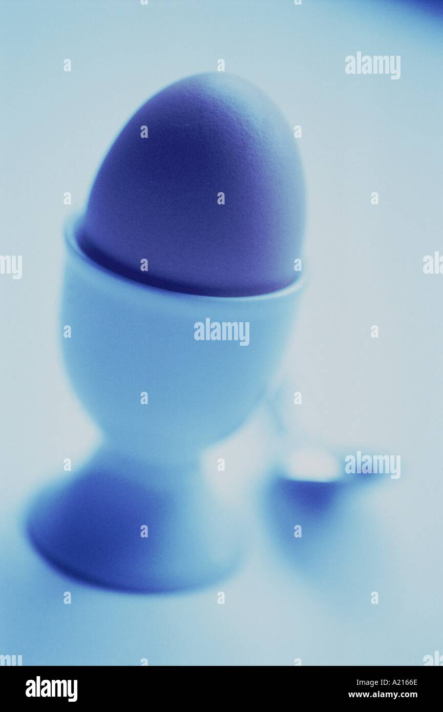 A blue boiled egg in an eggcup L Frost Stock Photo
