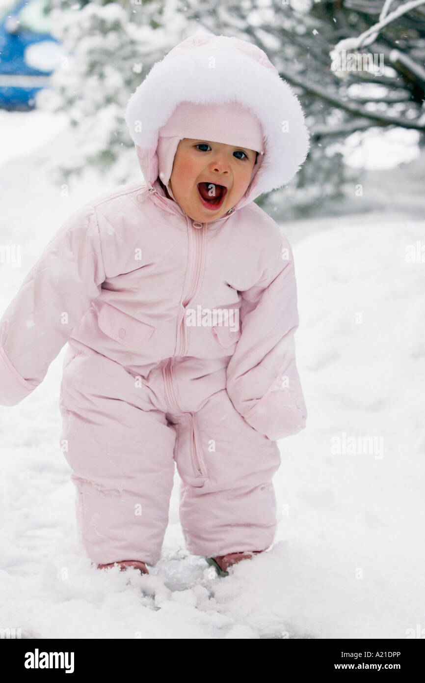 Portrait of Little Girl in Snow Stock Photo