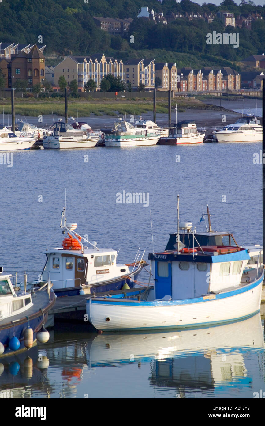 New riverside homes Rochester Kent for across the river Medway, with boats in foreground Stock