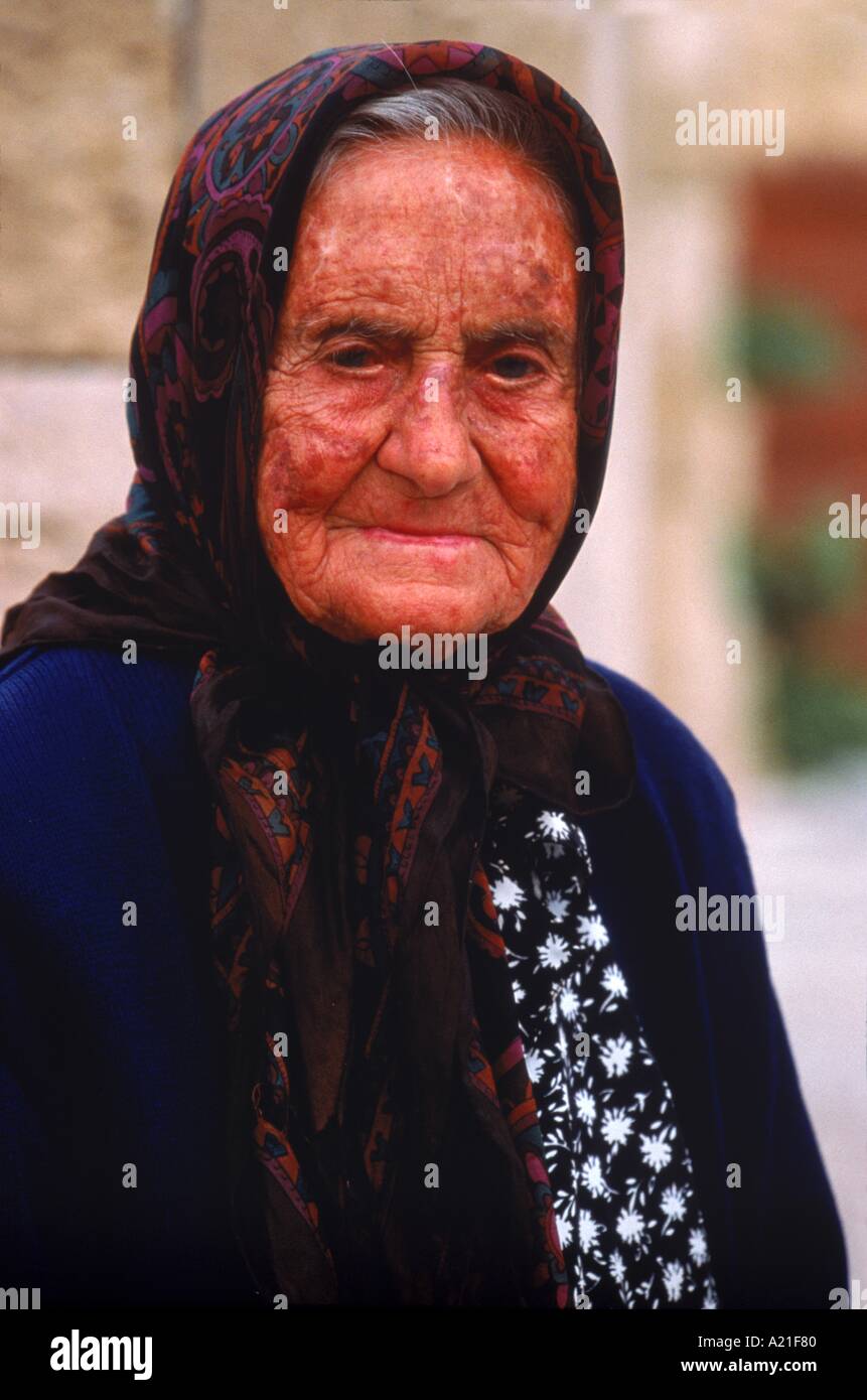 Portrait of an old woman in the Jewish Martyrs Quarter in the Old Town on the island of Rhodes Greece J Greenberg Stock Photo