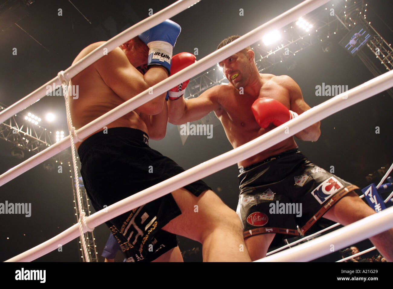 K1 kick boxing fighters in the ring,s een through ropes, Tokyo Dome, Tokyo, Japan Stock Photo