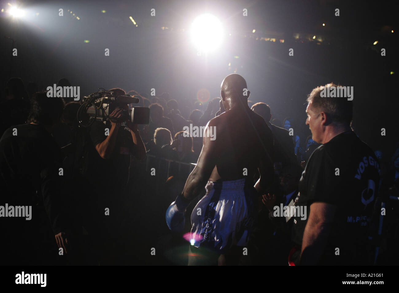 Televison crew follow a sportsman as he exits the ring, K1 fighting, Tokyo, Japan, Asia. Stock Photo