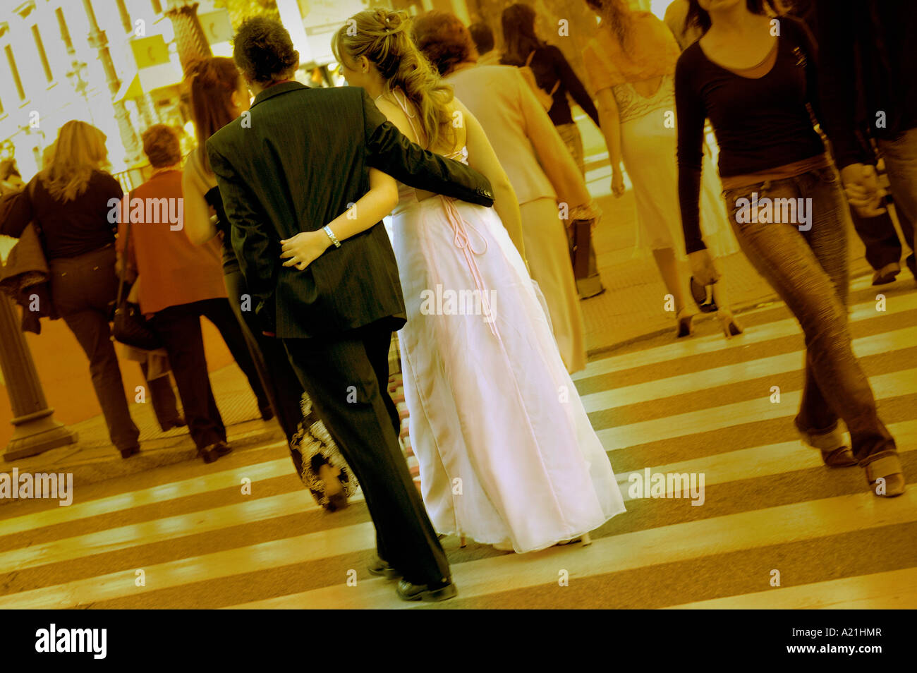 BRIDE AND BRIDEGROOM WALKING ON THE STREET Stock Photo - Alamy