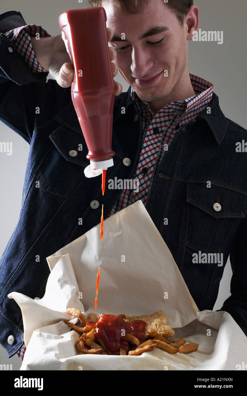 Man chips ketchup studio hires stock photography and images Alamy