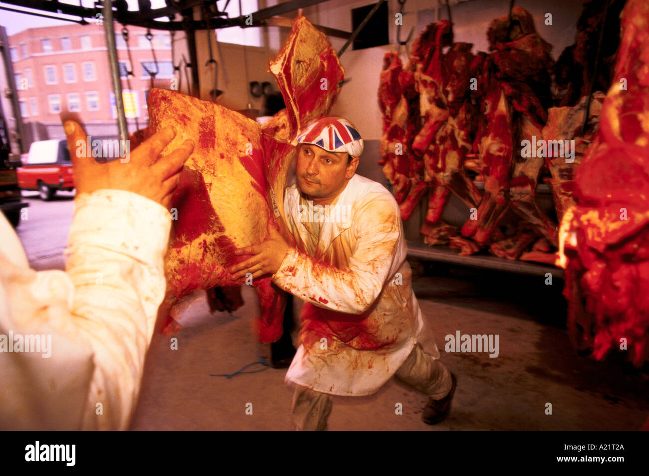 A butcher at Smithfields meat market Stock Photo Alamy