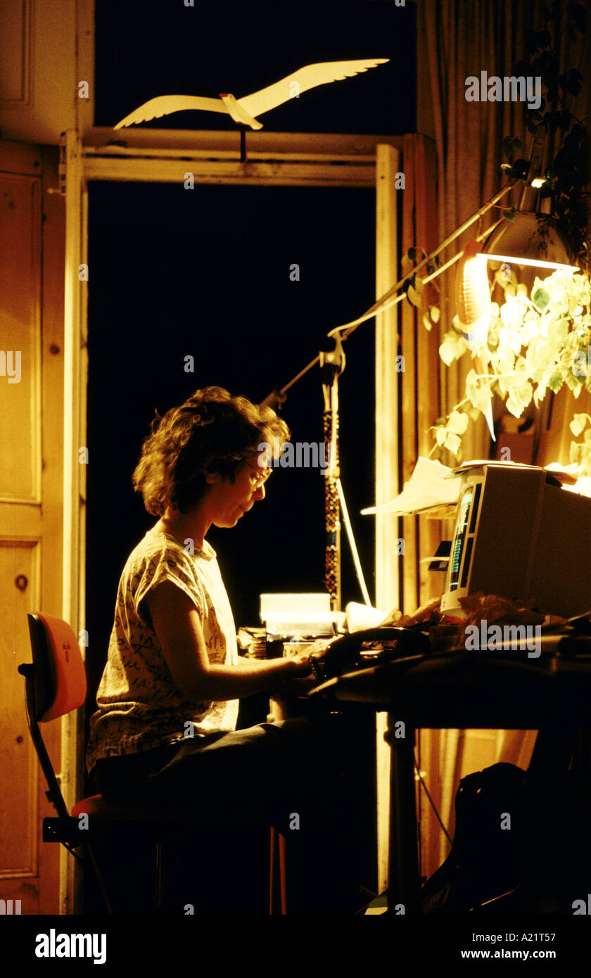 A woman using a computer at home, London Stock Photo