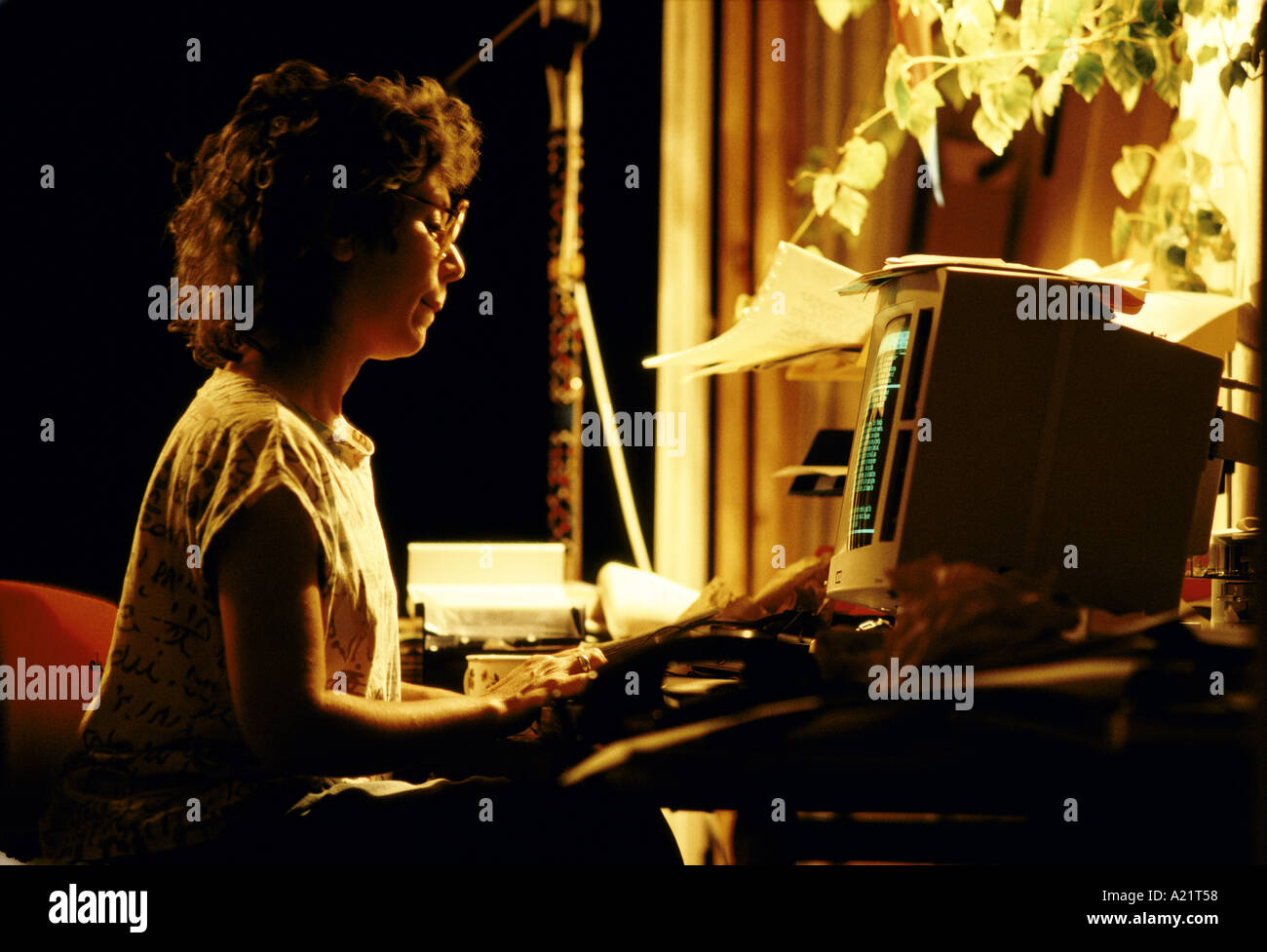 A woman using a computer at home, London Stock Photo