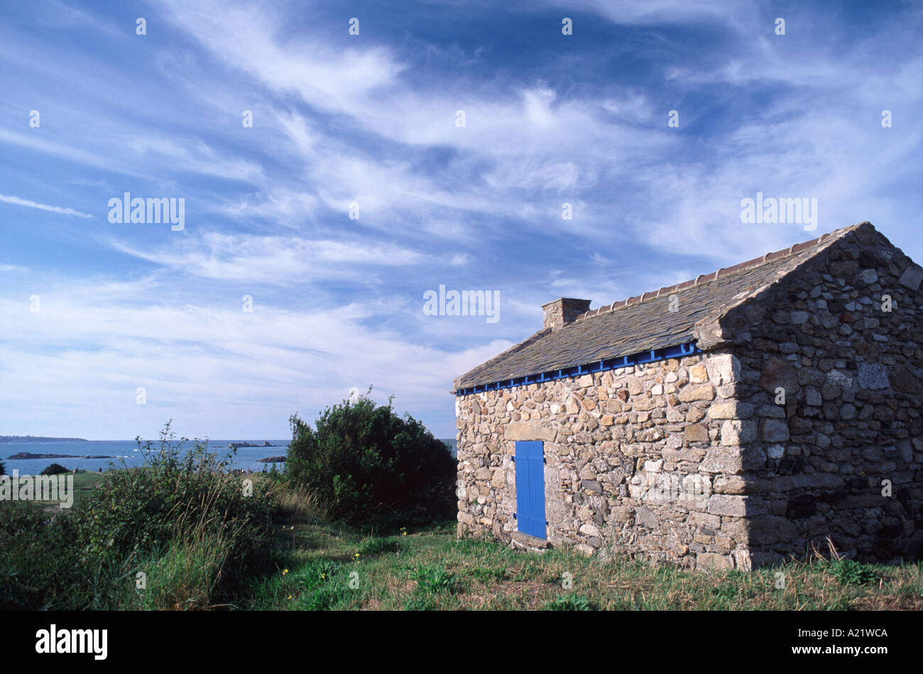 A stone cottage on the Pointe du Chevet at St Jacut de la Mer on the north Brittany coast, France Stock Photo