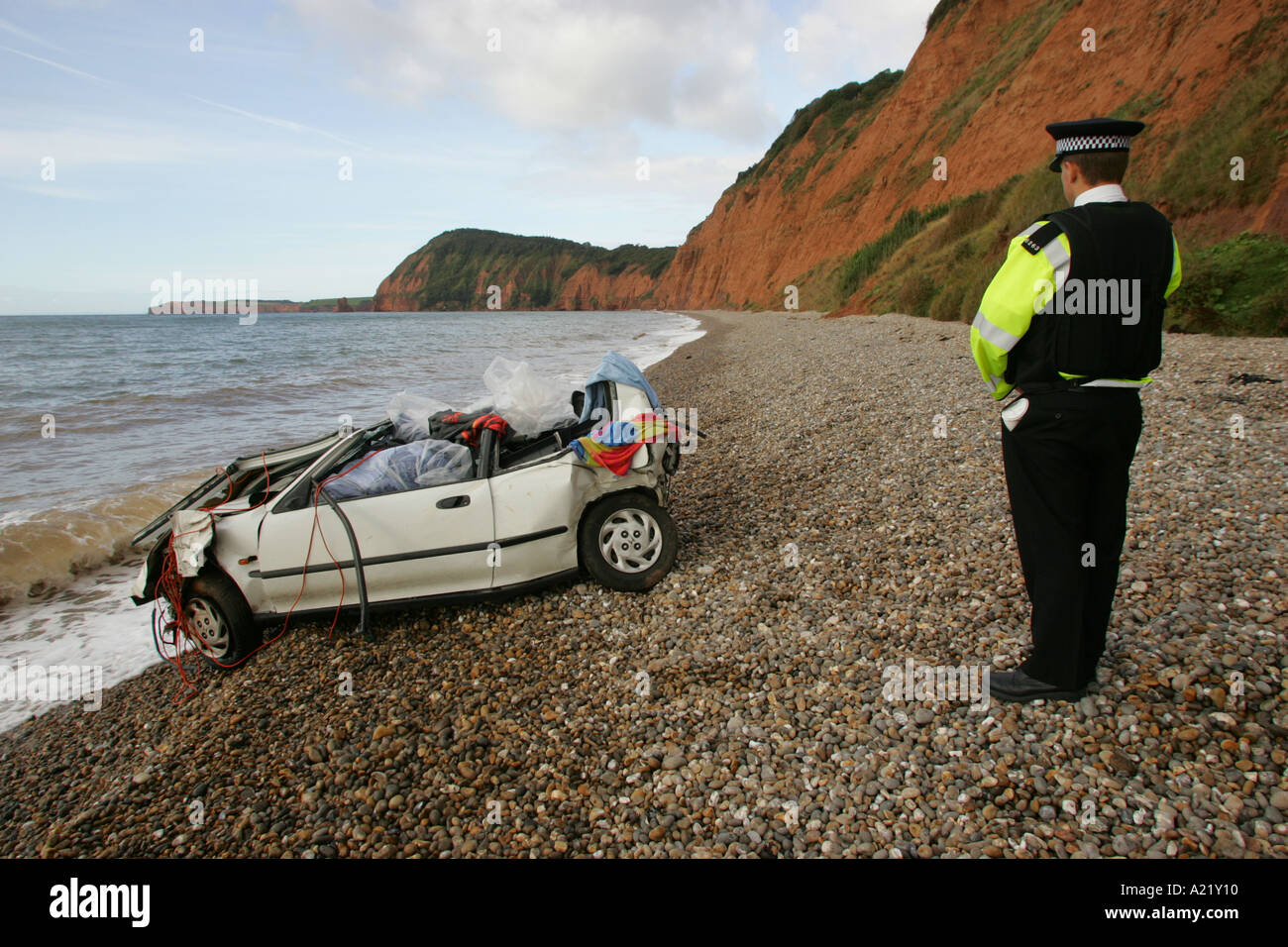 Car at the bottom of cliff at Jacob s Ladder Sidmouth UK Stock Photo