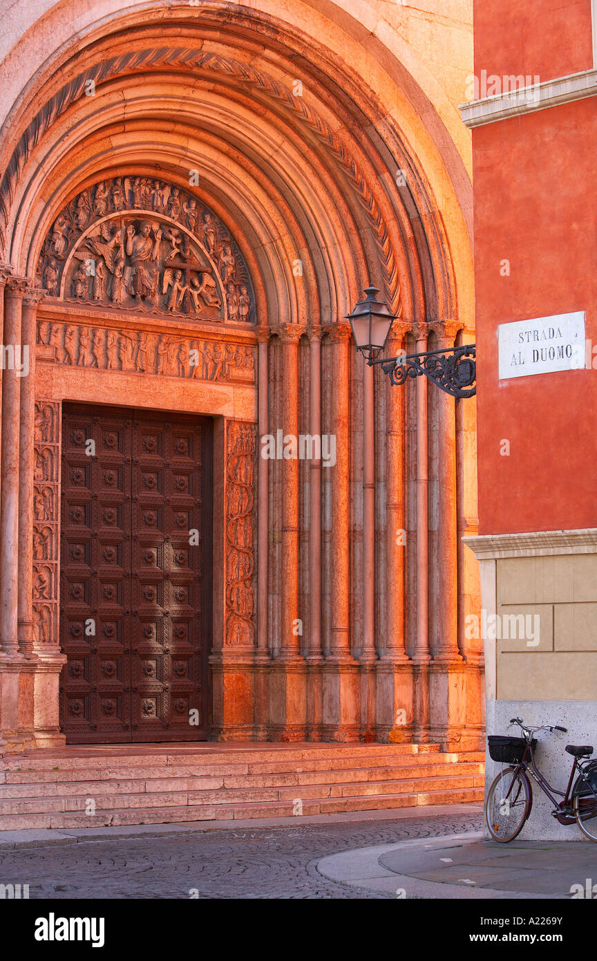 a detail of a street lamp and bicycle by a doorway of the Baptistry 1196 Piazza del Duomo Parma Emilia Romagna Italy NR Stock Photo