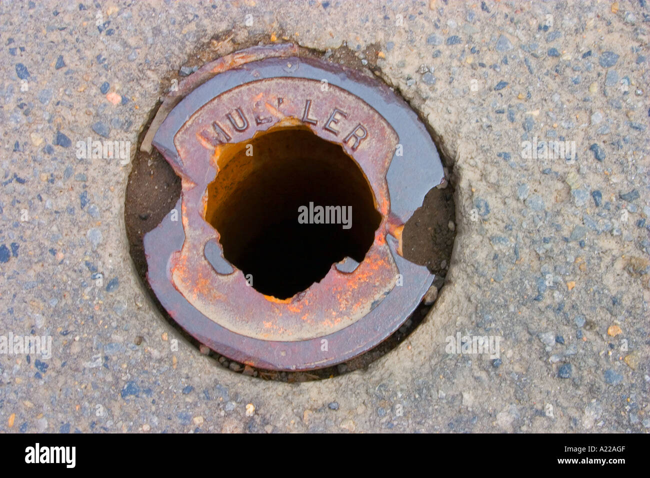Broken water pipe cover Stock Photo Alamy