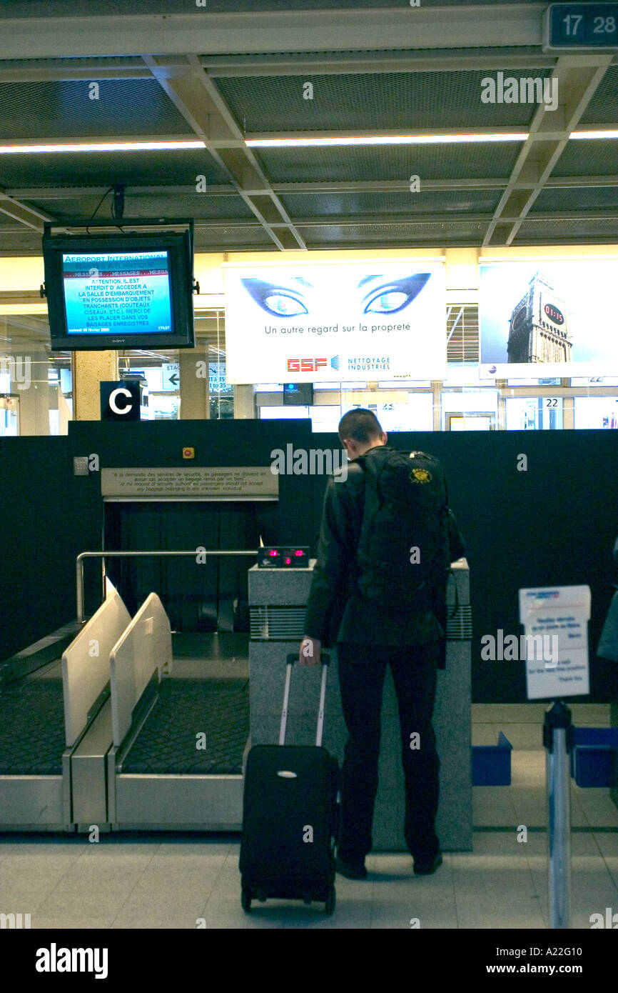 man boarding in airport desk Stock Photo