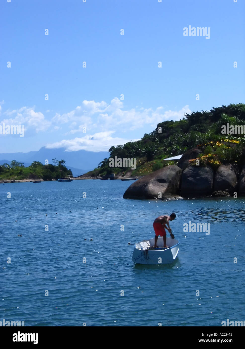 Local man in boat hi-res stock photography and images - Alamy