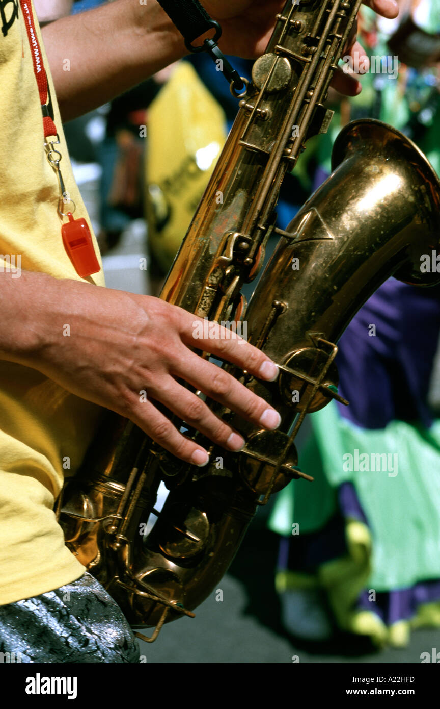 Saxophone player at street carnival "St Pauls" Bristol England UK Stock