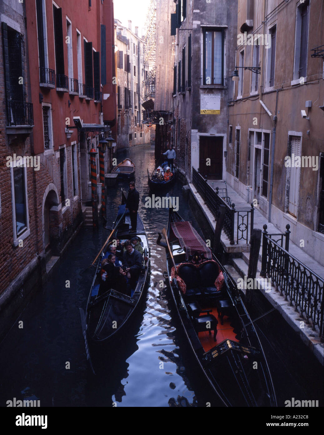 Boats passing on venetian canal hi-res stock photography and images - Alamy