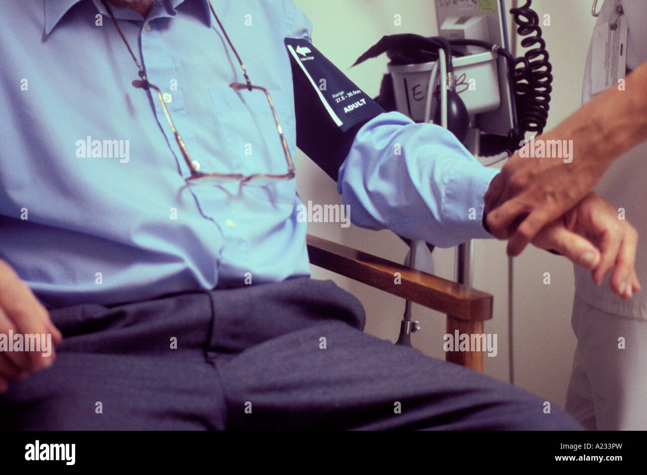 Man blood pressure taken hi-res stock photography and images - Alamy
