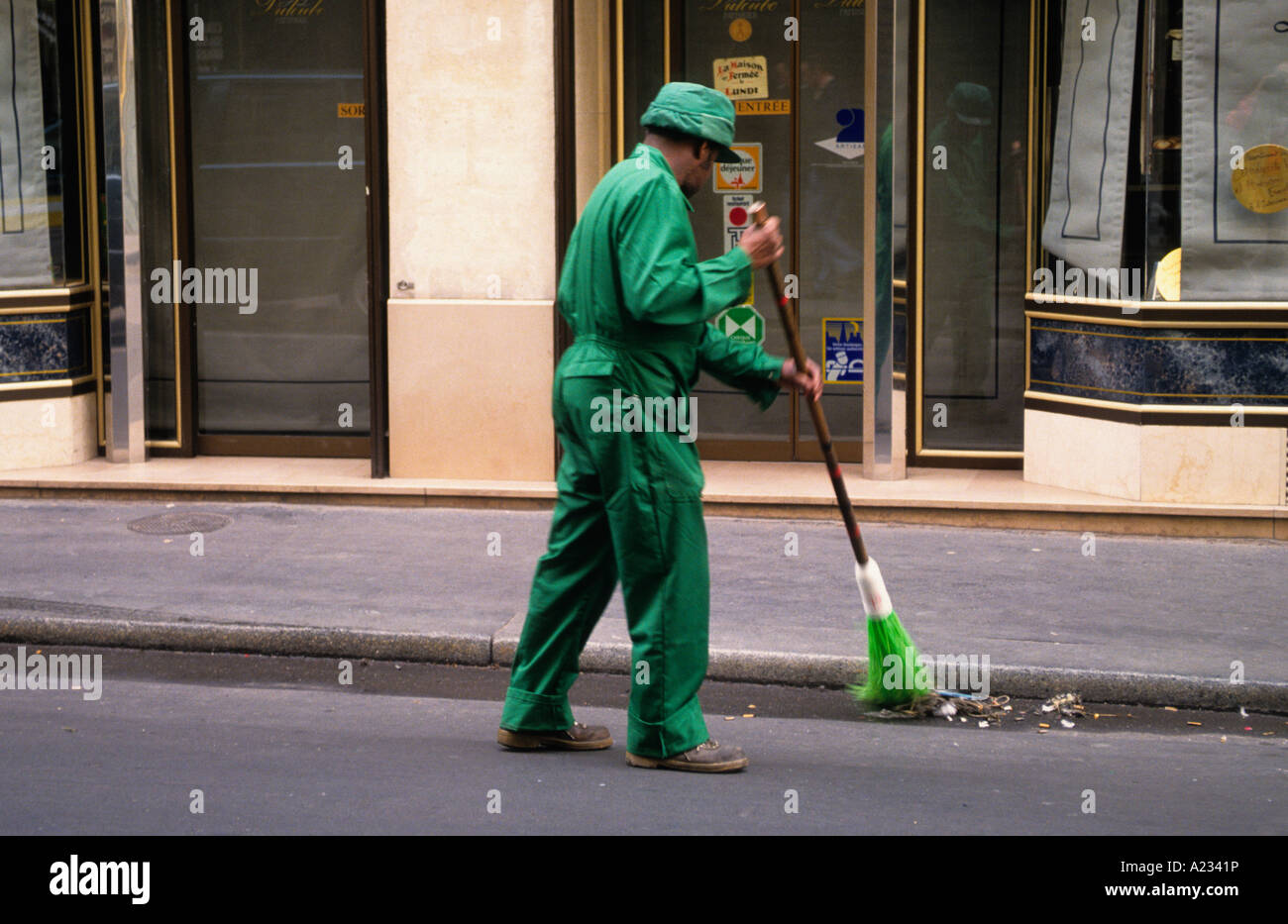 Paris France Cleaning the Streets Sanitation Worker Stock Photo