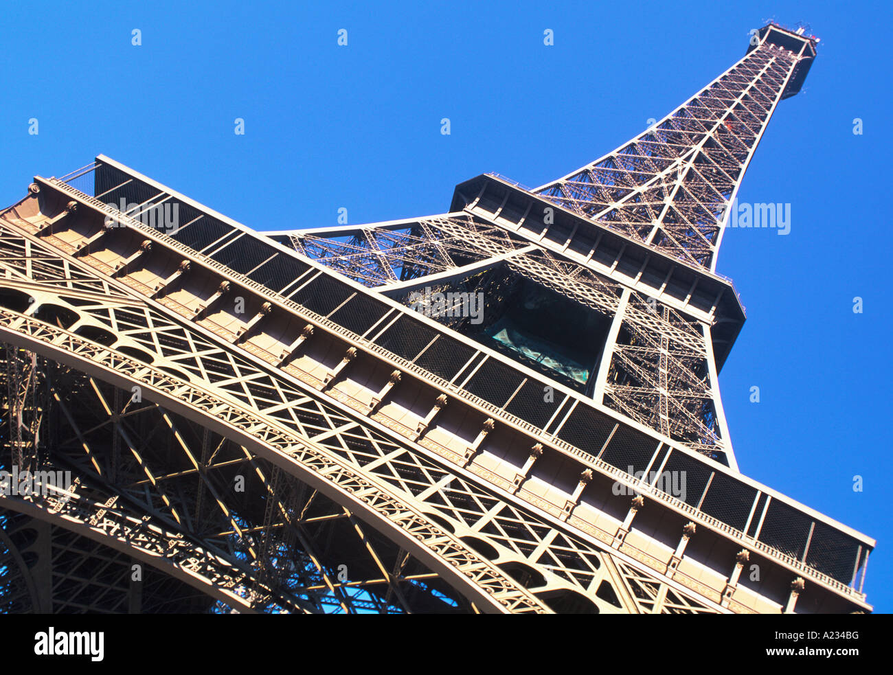 Eiffel Tower, France, Paris. Low angle close up view of the iconic monument on a beautiful day. Historic french Art Nouveau tourist site. Stock Photo