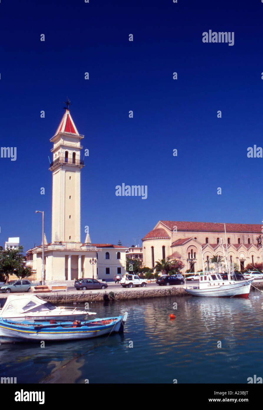Greece Ionian Islands Zakynthos Zante Town Fishing boats in the harbour and the Cathedral of Aghios Dionysios in the background Stock Photo