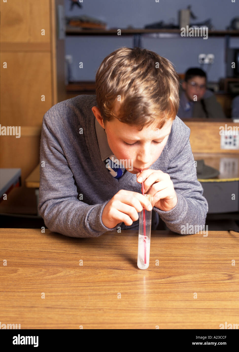 Limewater Turns Milky As Boy Blows Carbon Dioxide Through It See Stock Photo Alamy