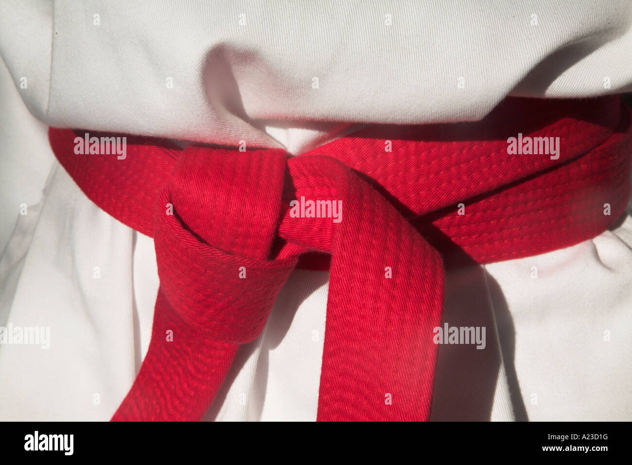 Close up knotted red karate belt being worn Stock Photo Alamy