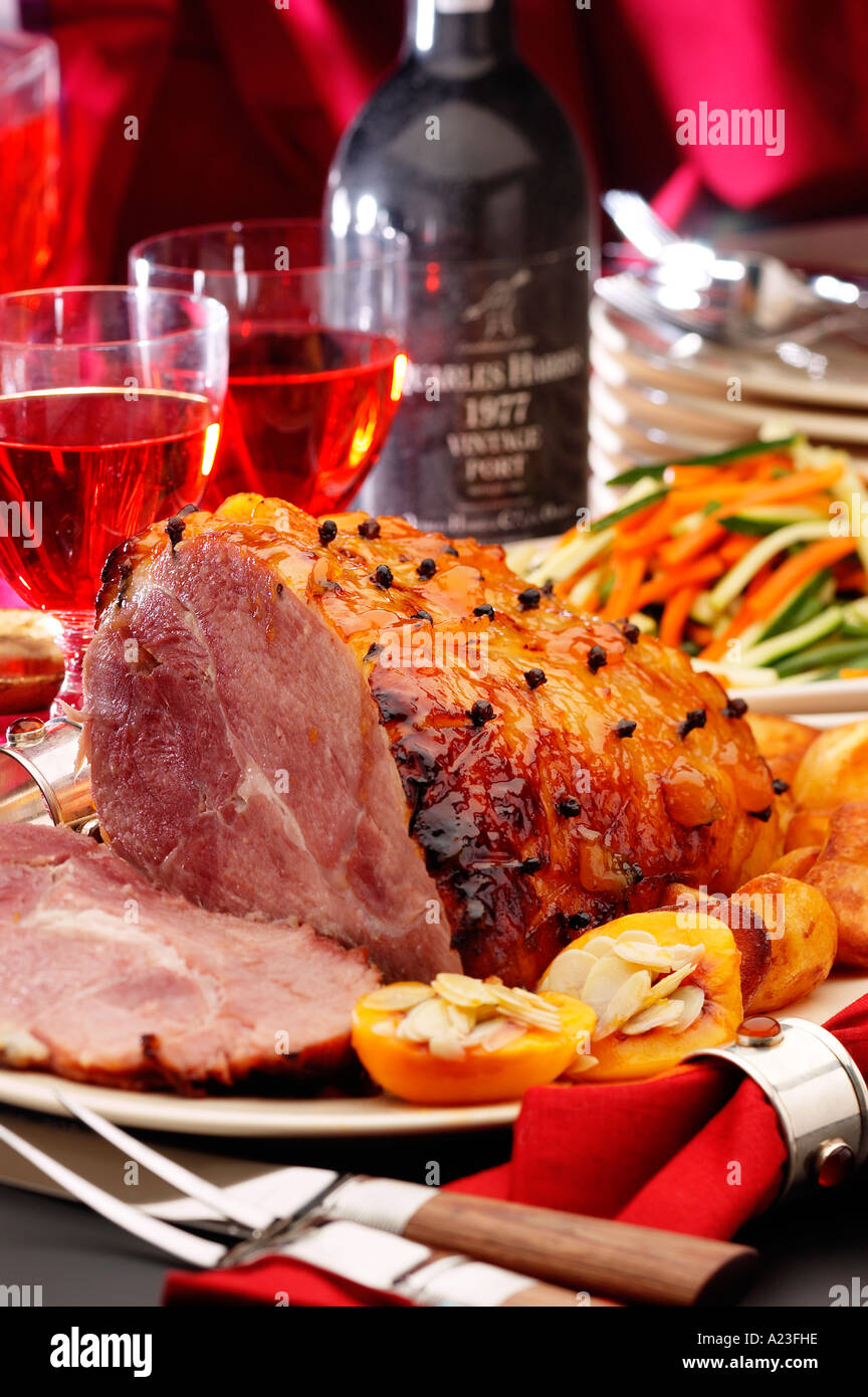Roast gammon joint studded with cloves, with apricots almonds