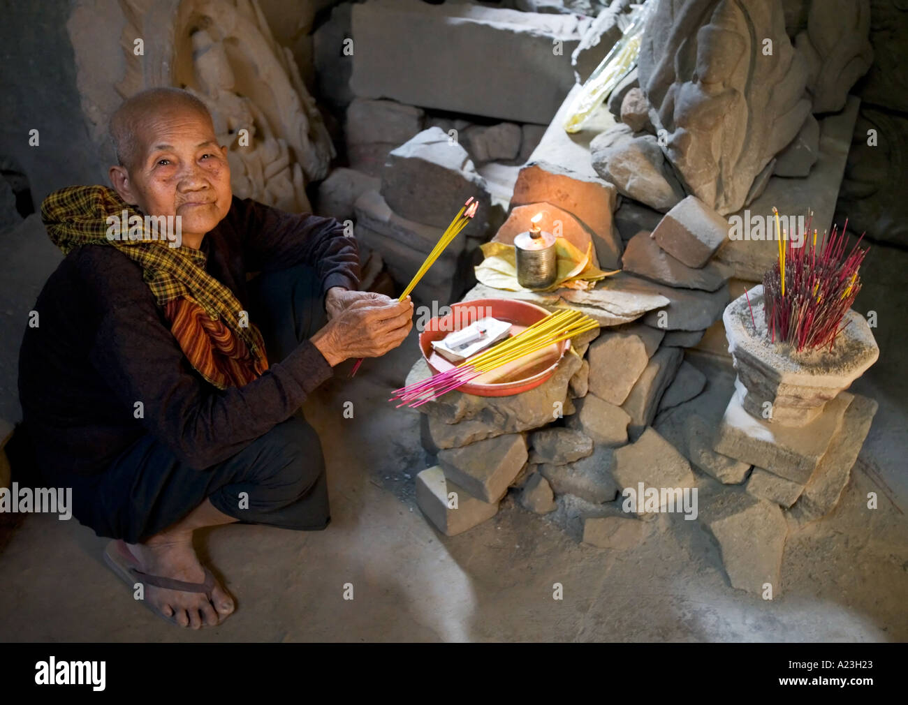 Incense burning at asian temple in cambodia hi-res stock photography ...